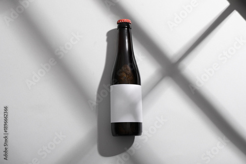 Bottle of cold beer on grey...