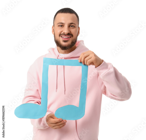 Young man with paper music ...