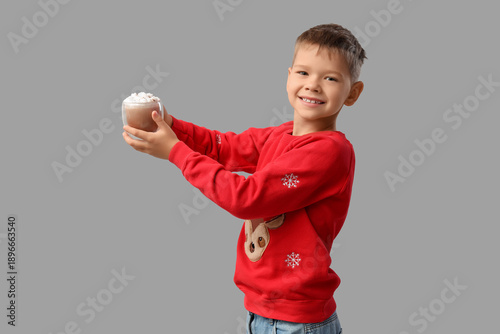 Cute little boy with cup of...