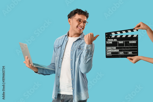 Male screenwriter with lapt...