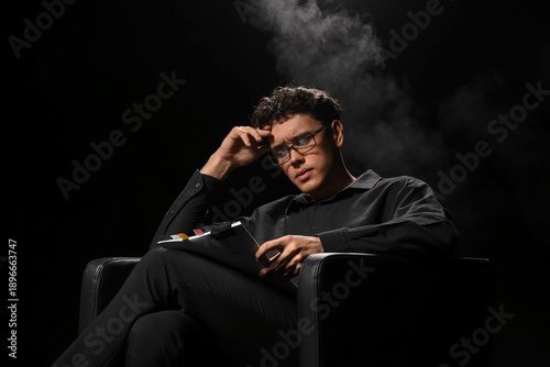 Male screenwriter with scen...