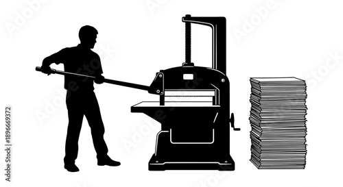 Man operating industrial printing press with stack of paper nearby