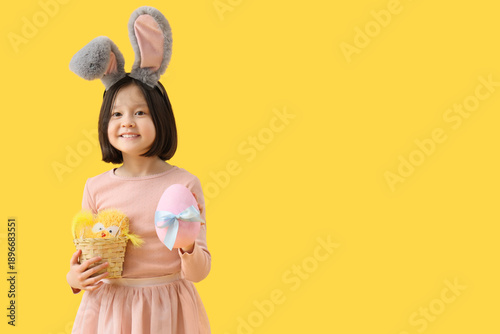 Cute Asian girl in bunny ea...