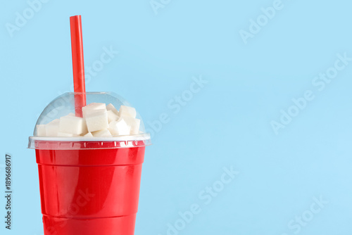 Cup of soda with sugar cube...