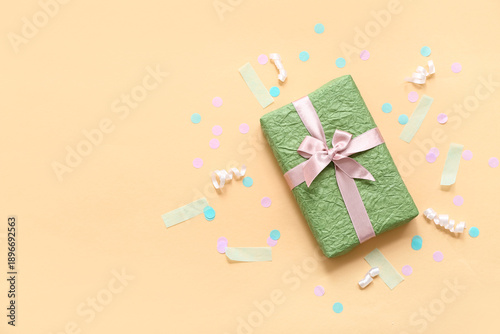 Green gift box with serpent...