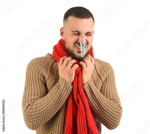 Ill young man with clothesp...