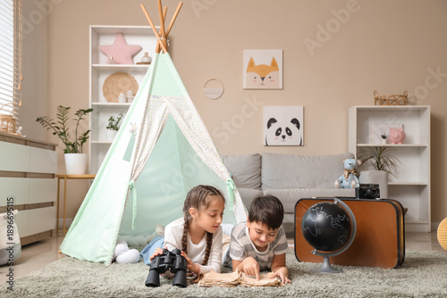 Cute children with binocula...