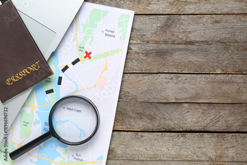 City map with laptop, passp...