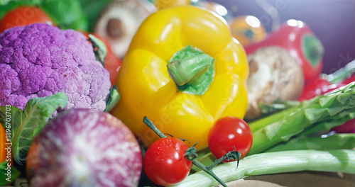 Colorful collection of fresh vegetables in a basket at a local market during daytime in an urban area