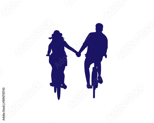 Couple enjoying a peaceful bike ride together in silhouette
