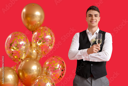Young man in prom suit with...