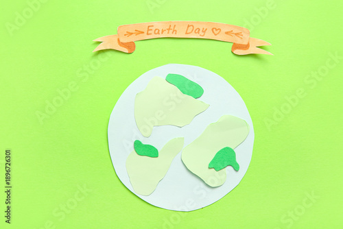 Paper planet Earth and sign...