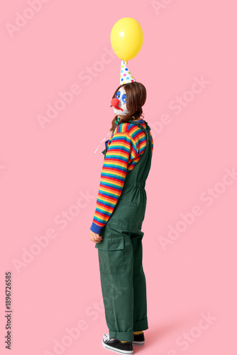 Young woman dressed as sad ...