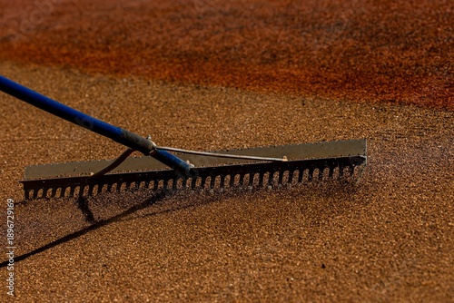 Detail of a rake being used by a worker while preparing the field at Pan American Stadium , ahead the 2026 Serie Del Caribe on January 31, 2026 in Guadalajara, Mexico