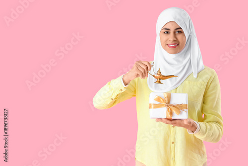 Muslim woman with gift box ...