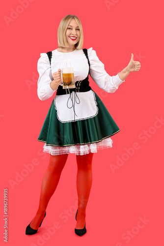 Happy woman with beer showi...