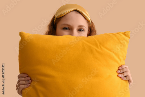 Young woman in sleep mask w...