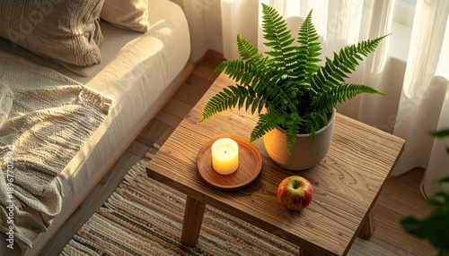 Cozy Interior Scene with Fern, Candle, and Apple on Wooden Table.