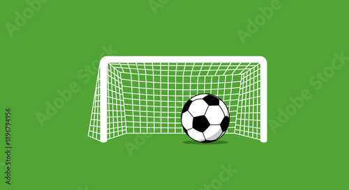 A soccer ball positioned near a goal on a vibrant green field, ideal for sports themes