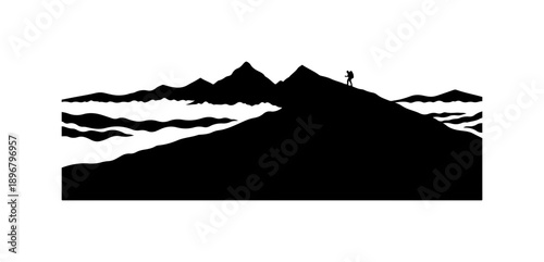 Silhouette of Hiker on Mountain Peak at Sunset