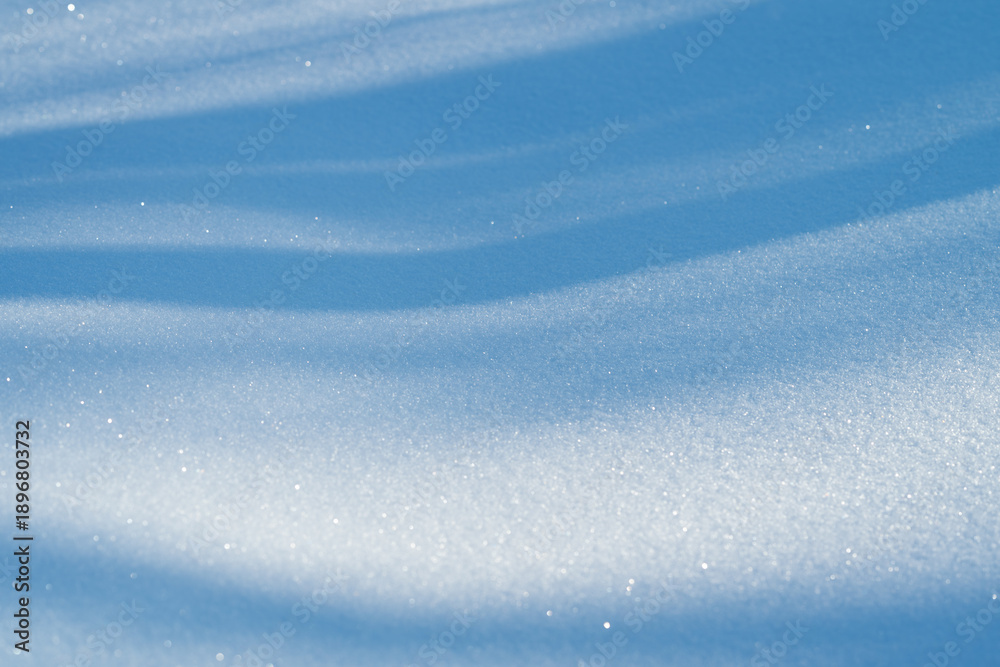 Obraz premium Vivid snow and sunlit ice sparkle with flowing textures and details, Brightly shining snow and illuminated ice display intricate glittering patterns and smooth flowing textures