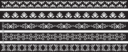 Abstract black and white pattern with symmetrical swirling designs and lines