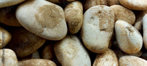 Close-Up of Smooth River Pebbles with Earthy Tones