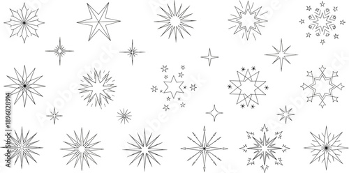 Collection of various snowflakes and stars in different sizes and designs scattered across the image
