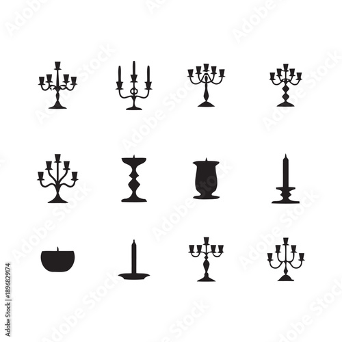 Collection of decorative black silhouettes of candelabras and candle holders various styles isolated on white background for design elements