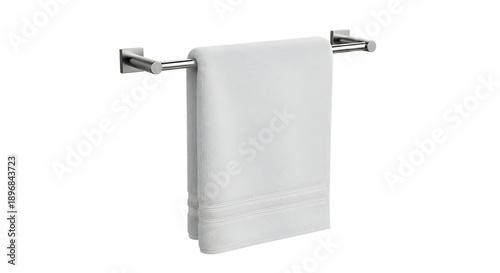 A white towel hanging on a modern silver towel rack