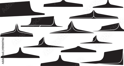 Collection of abstract black shapes on white background