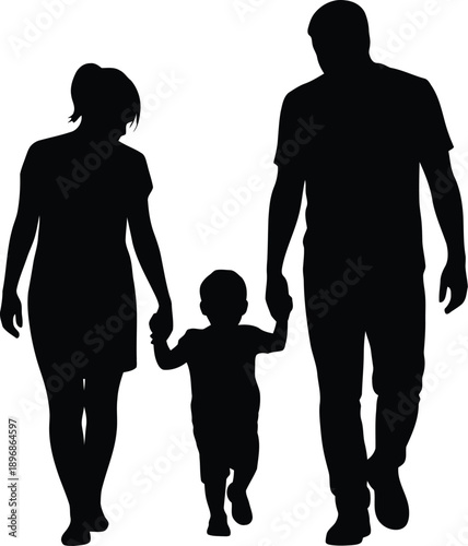 Silhouette of a mother and father holding hands with their small child walking forward together as a family.