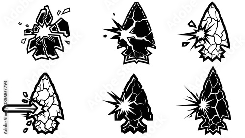 Set of six broken and cracked obsidian arrowheads, ancient weapon fragments.