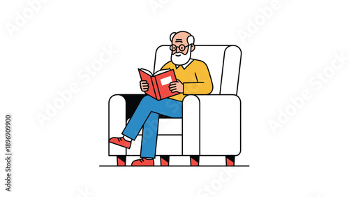 Senior man with a white beard and glasses sitting comfortably in a large white armchair while focused on reading a red book.