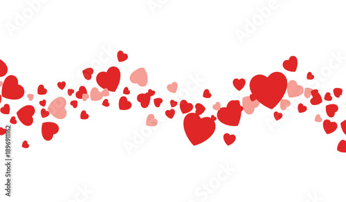 Colorful red and pink hearts floating on a for valentines day or love themed designs and decorations