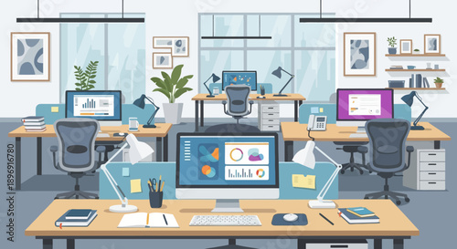 Modern office interior with computers and desks.