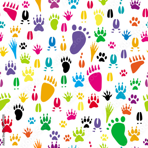 Various colorful common animal paw print silhouettes, seamless pattern