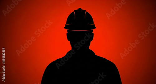 Silhouette of a construction worker wearing a hard hat.