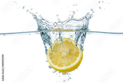 Fresh yellow lemon slice dropping into clear water splash, isolated fruit with bubbles on white background, realistic macro photography