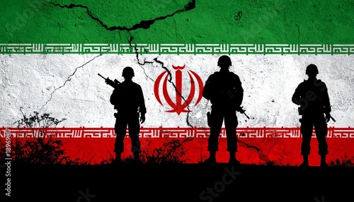 Silhouetted soldiers before cracked Iranian flag—symbol of military presence, conflict, and national tension.