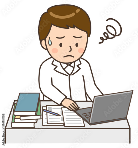 パソコンの前で困っているデスクワーク中の男性医師