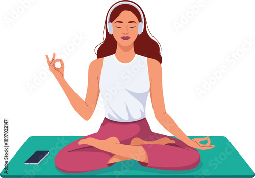 Serene woman meditating with headphones on yoga mat listening music for relaxation stress relief and mindfulness peaceful posture in modern interior wellbeing lifestyle concept for health and wellness