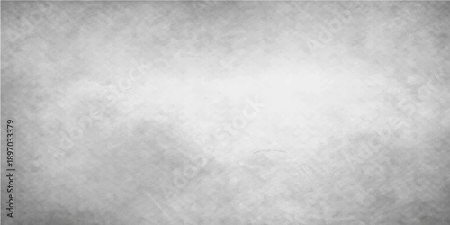 A dark gray brushed metal plate texture features a weathered pattern of aged concrete and rough stone surface for a vintage industrial design backdrop