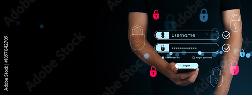 Tableau sur toile Businessman holding smartphone with digital login interface and password input on dark background representing online security concept