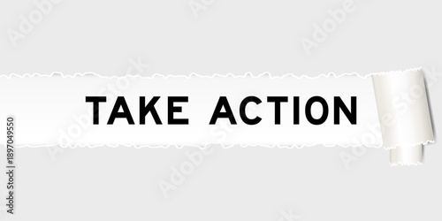 Ripped gray paper background that have word take action under torn part
