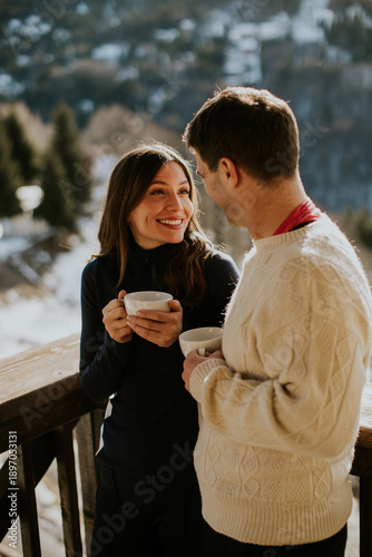 Couple enjoying warm drinks...