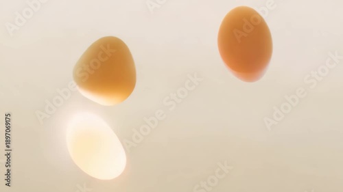 Three eggs floating against a light, neutral background