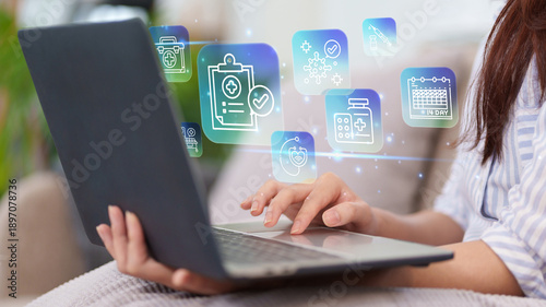 Tableau sur toile Woman use laptop access digital health insurance records with online medical ico