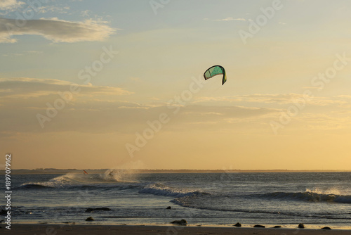 
Outdoor water sport, practicing skitesurfing in the waters of Jericoacoara, Ceará, Brazil. Sunset in summer time.