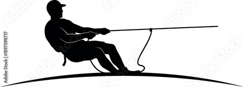 Man sitting on a curved surface holding a long rod